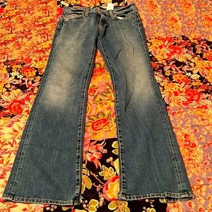 GAP low rise bootcut jeans in distressed style
